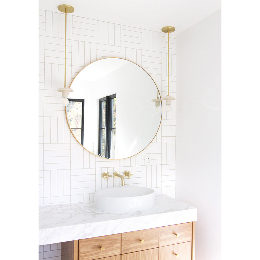 Archer shown in Brass. Interior design by Sarah Sherman Samuel