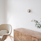 Brass Cutie Small shown in Heirloom Brass in a room