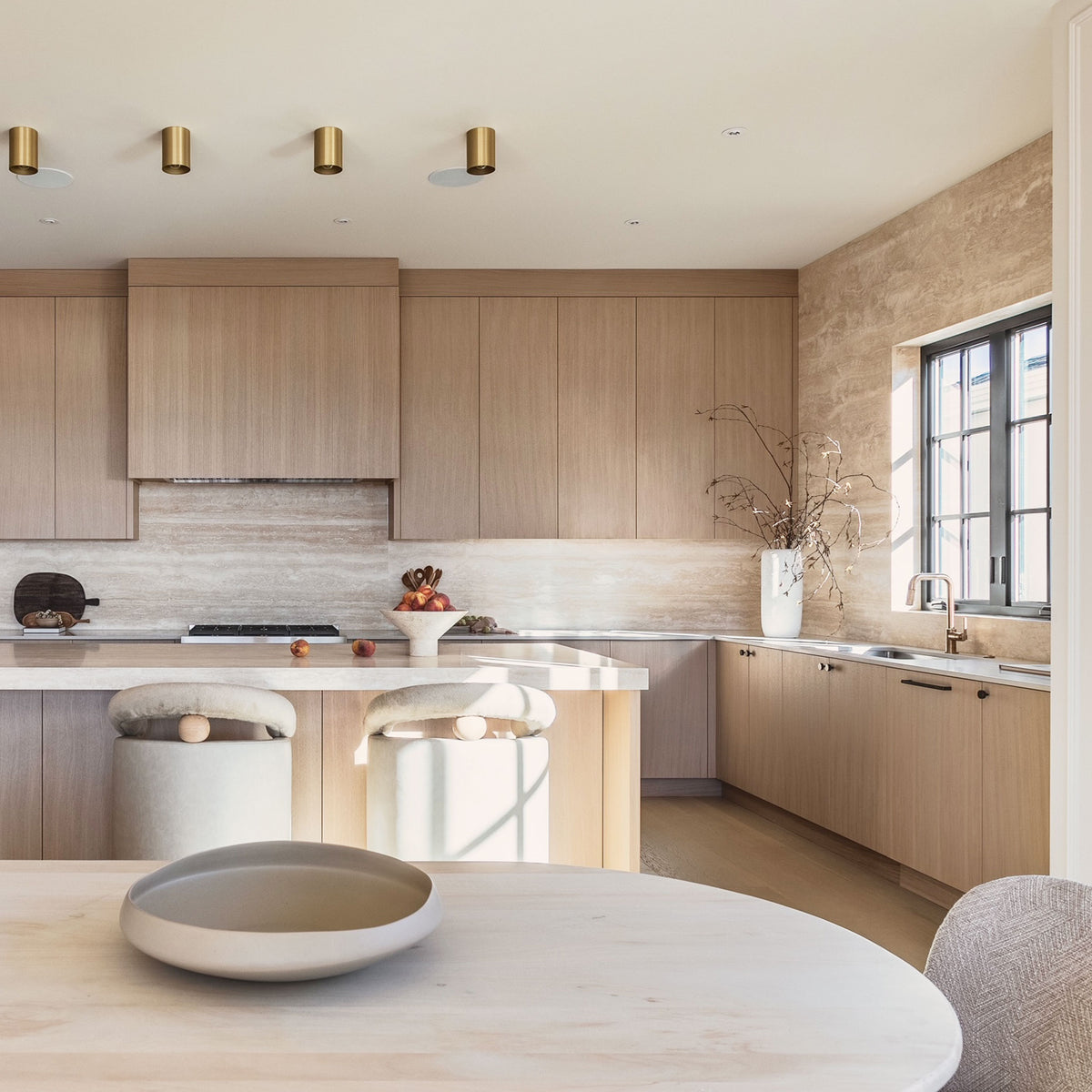 Cape Longs in Heirloom Brass. Interior Design by Tomlenovich