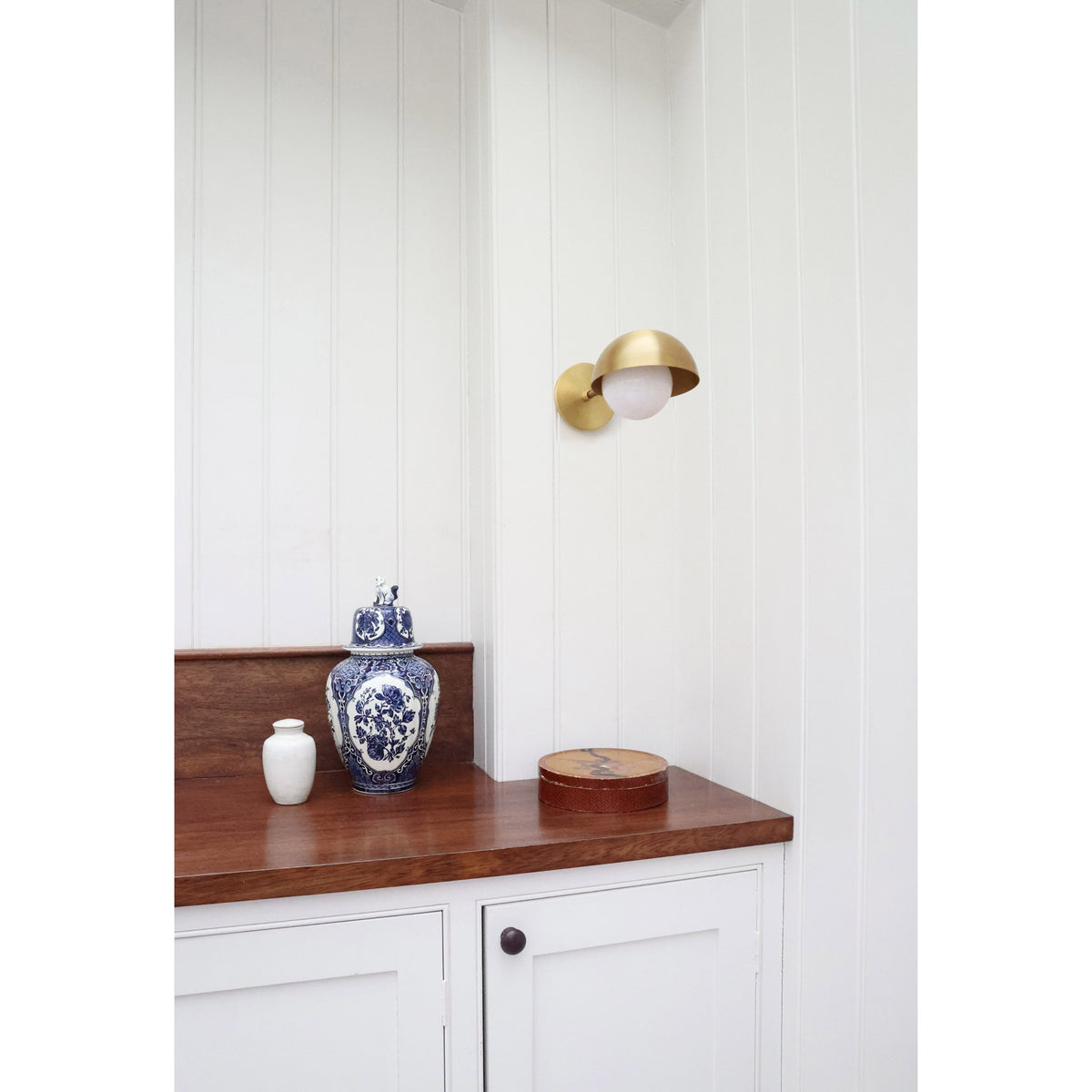 Noor Sconce shown in Heirloom Brass
