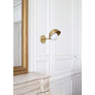 Noor Sconce shown in Heirloom Brass