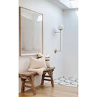 Ramona 10" shown in Brass with an Opal 10" globe. Interior design by Liz Bachman