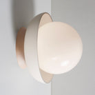 Terra Lexi shown in Bone ceramic and Maple wood canopy