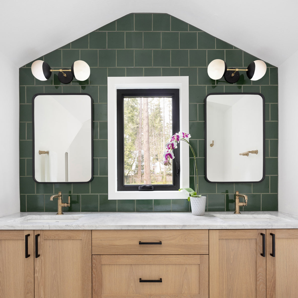Theo Sconces in Matte Black with Brass. Interior Design by Anna West. Photography by Meagan Larson