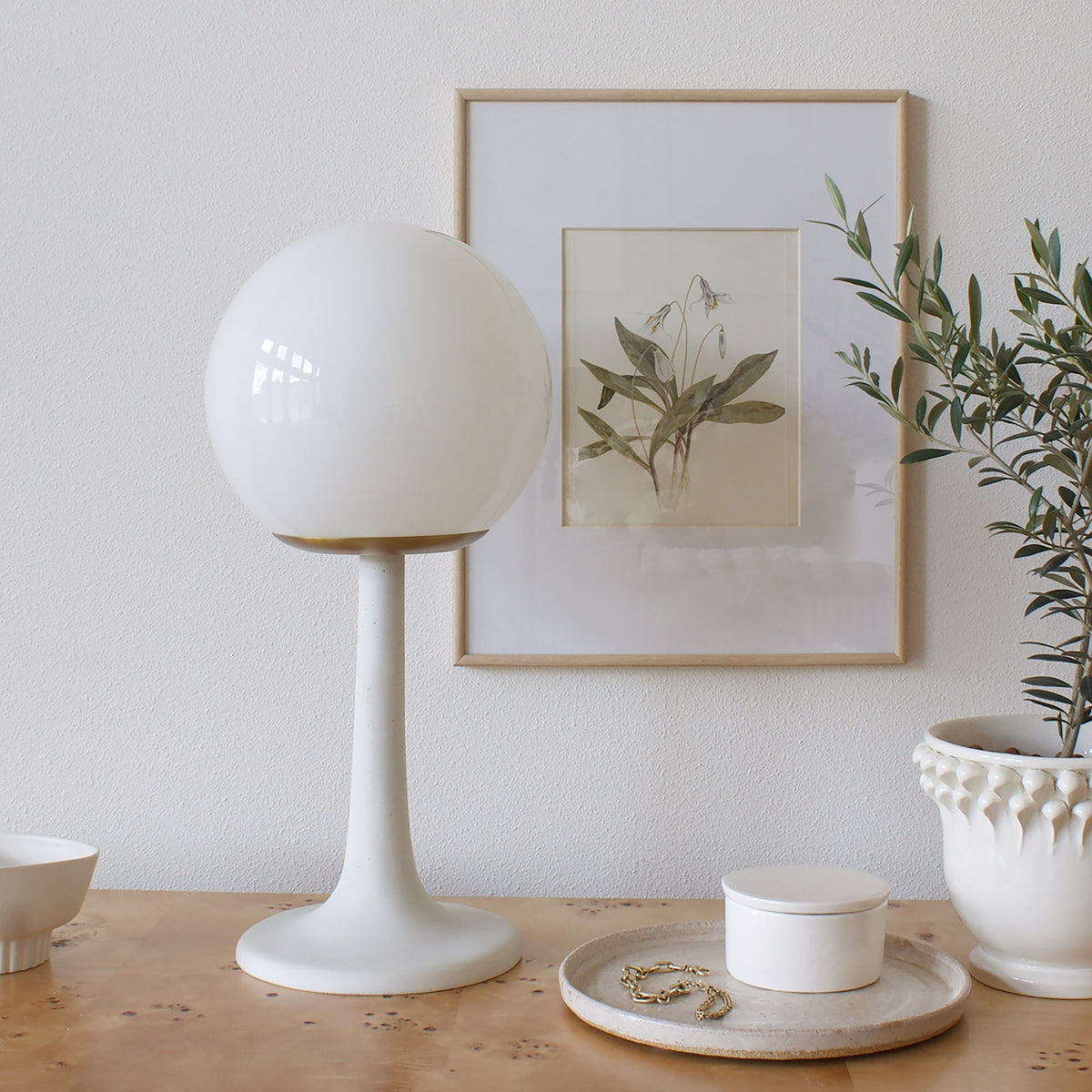 Aaro Lamp shown in Heirloom Brass