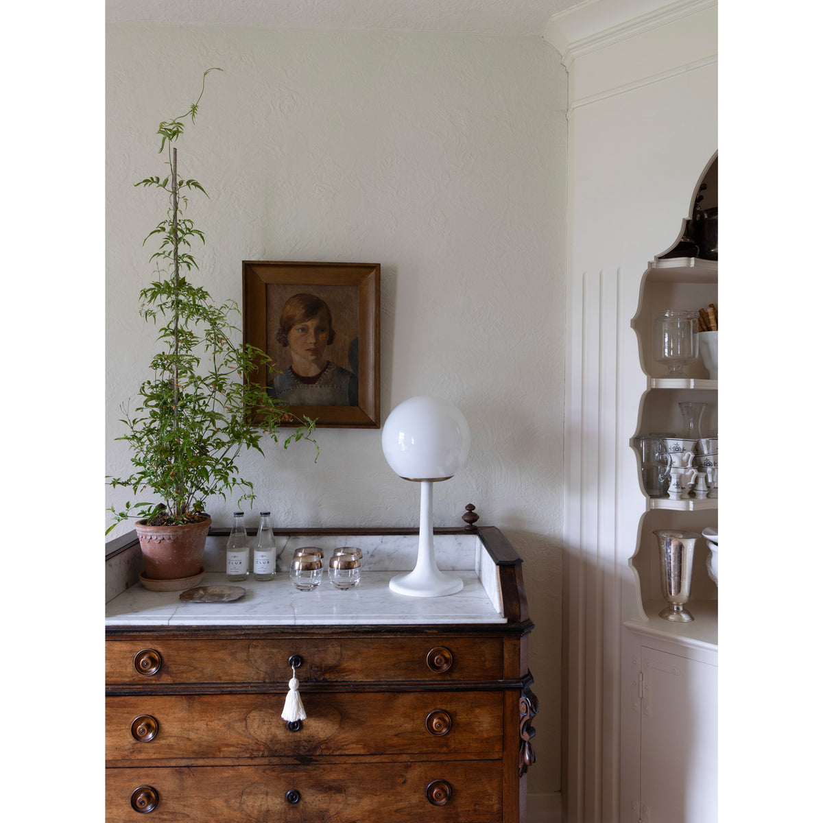 Aaro Lamp shown in Heirloom Brass.  Interior design by Sarah J. Meyer Design