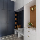 Amélie Sconce 6" shown with 3" arm in Brass. Interior design by Alykhan Velji Design