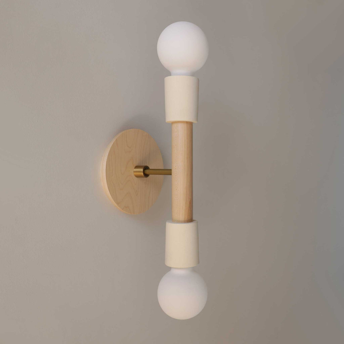 Bailey Sconce shown in Maple and Heirloom Brass with a Maple Wood Canopy