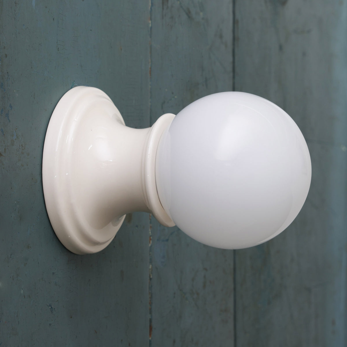 Emma Globe Sconce shown with Gloss White Glaze