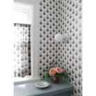 Emma Globe Sconce shown with Gloss White Glaze with Filling Spaces Wallpaper