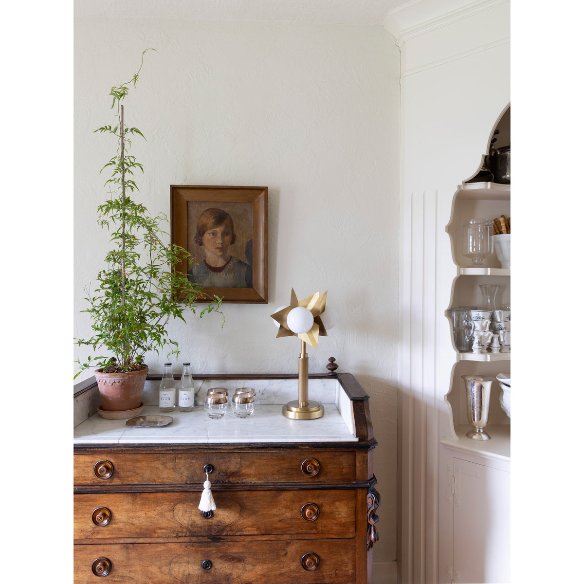 Florence Table Lamp shown in Heirloom Brass. Interior design by Sarah J. Meyer Design
