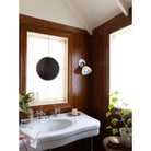 Grace Flush Sconce shown in Graphite Patina with a Gloss White Ceramic canopy and Opal Glass shade. Interior design by Sarah J. Meyer Design