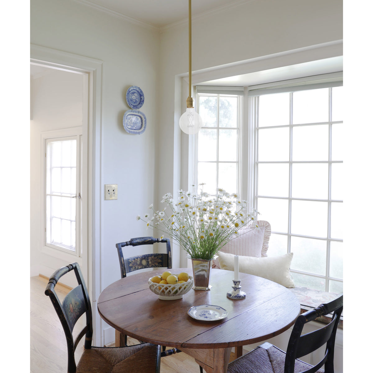 Grace Rod Pendant shown in Brass