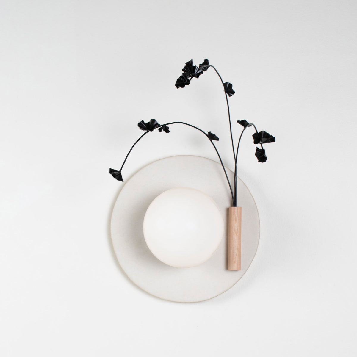 Ikebana Sconce shown in Natural White Glaze with Graphite Patina flower finish and Right mounted vase