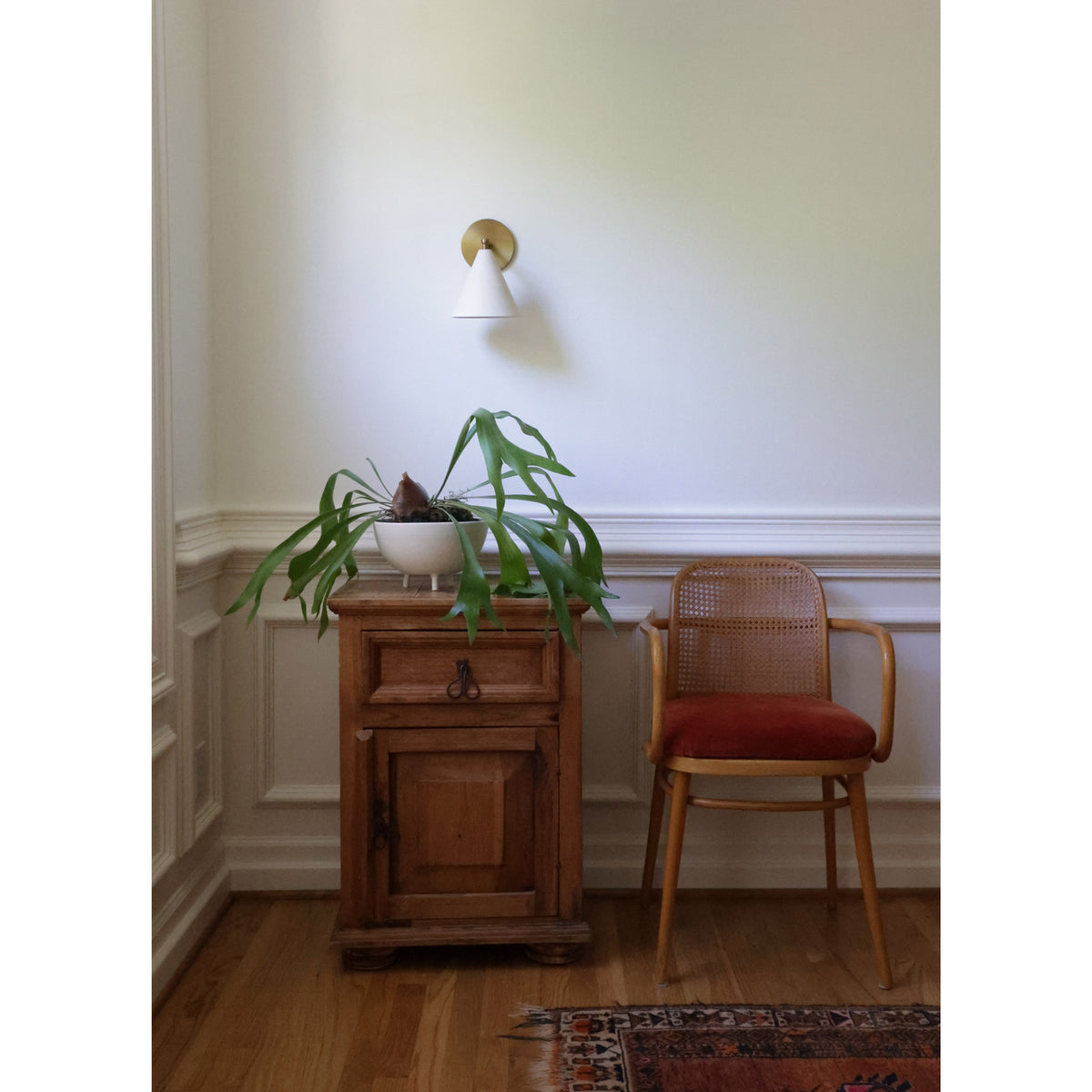 Petra Ceramic Sconce Shown in Heirloom Brass with a 3" Rod