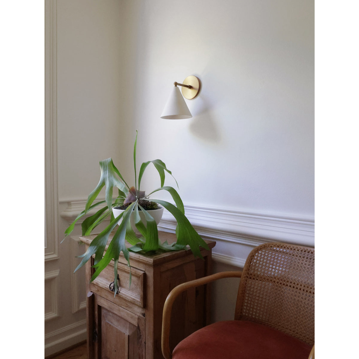 Petra Ceramic Sconce Shown in Heirloom Brass with a 3" Rod