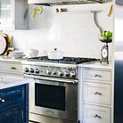 Fjord Spots shown in Brass. Interior design by Tyler Karu. Photo by Justin Levesque