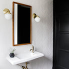 Alto Sconce 6" shown in Brass with an Opal 6" globe. Interiors by Sarah Sherman Samuel