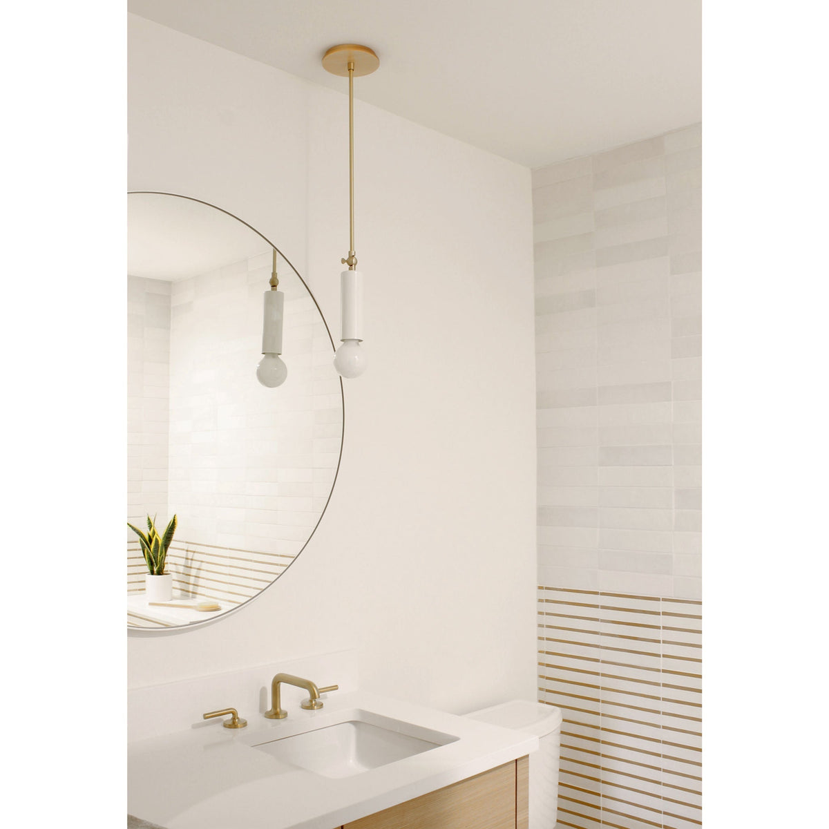 Fjord Spot Pendant for  Vaulted Ceiling shown in White with Brass. Interior Design by Teal Davison
