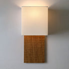 Ode Sconce shown in Oak