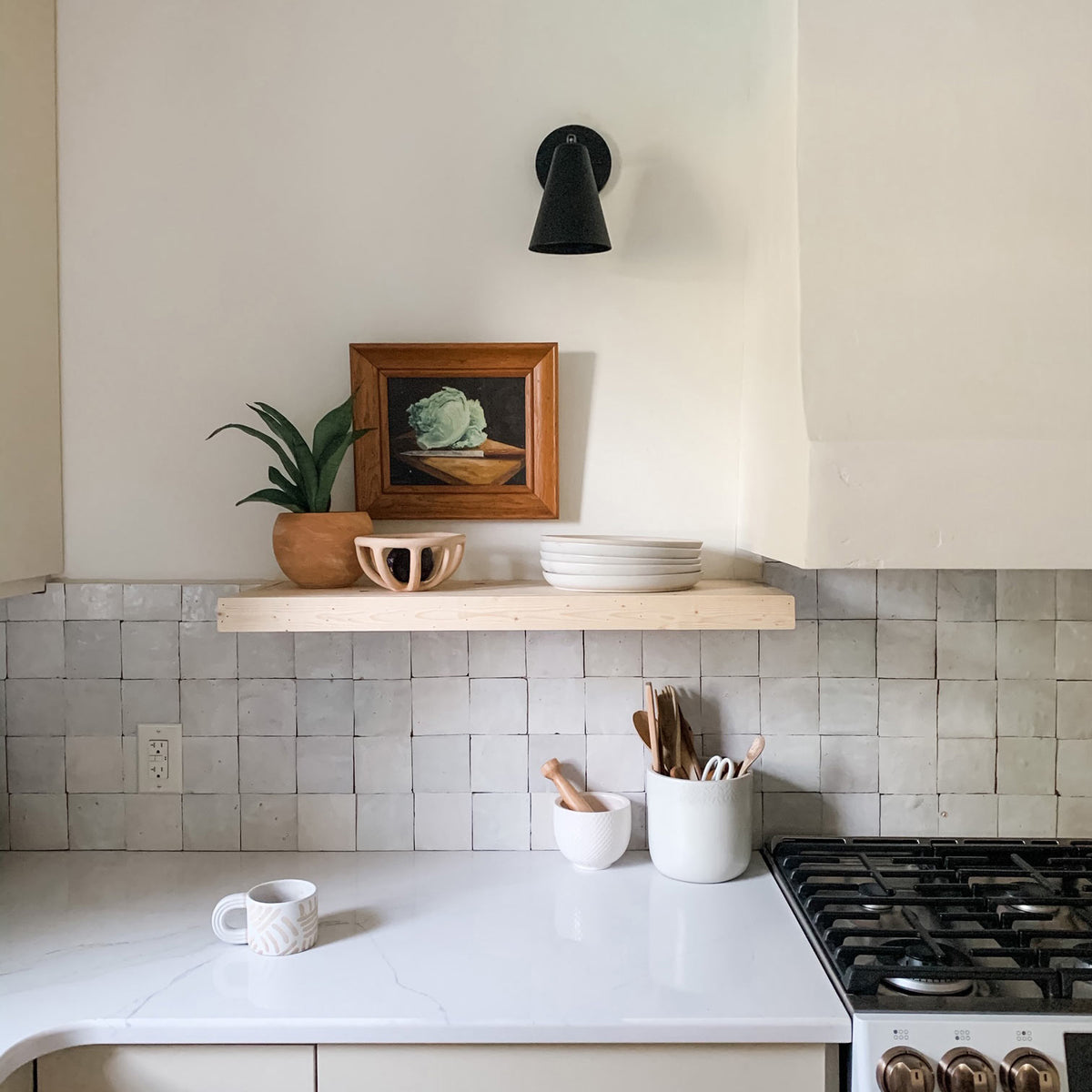 Tilt Cone shown in Matte Black finish with 3" arm. Interior design by Alyssia Moore