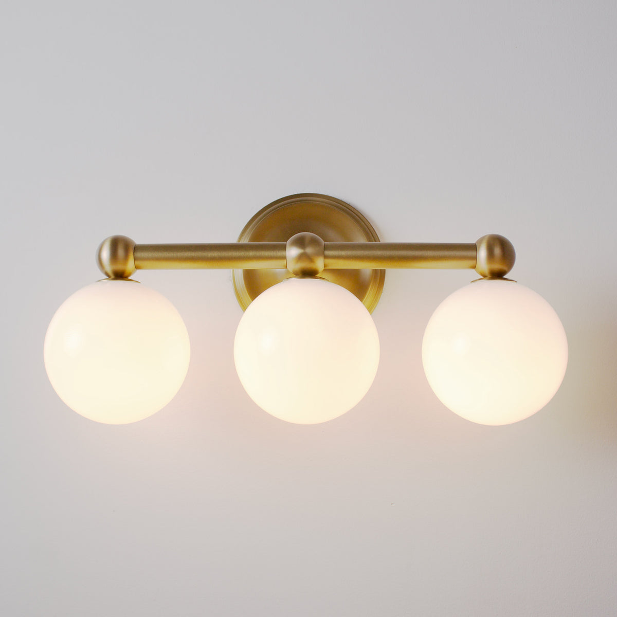 Eleanor Triple shown in Brass