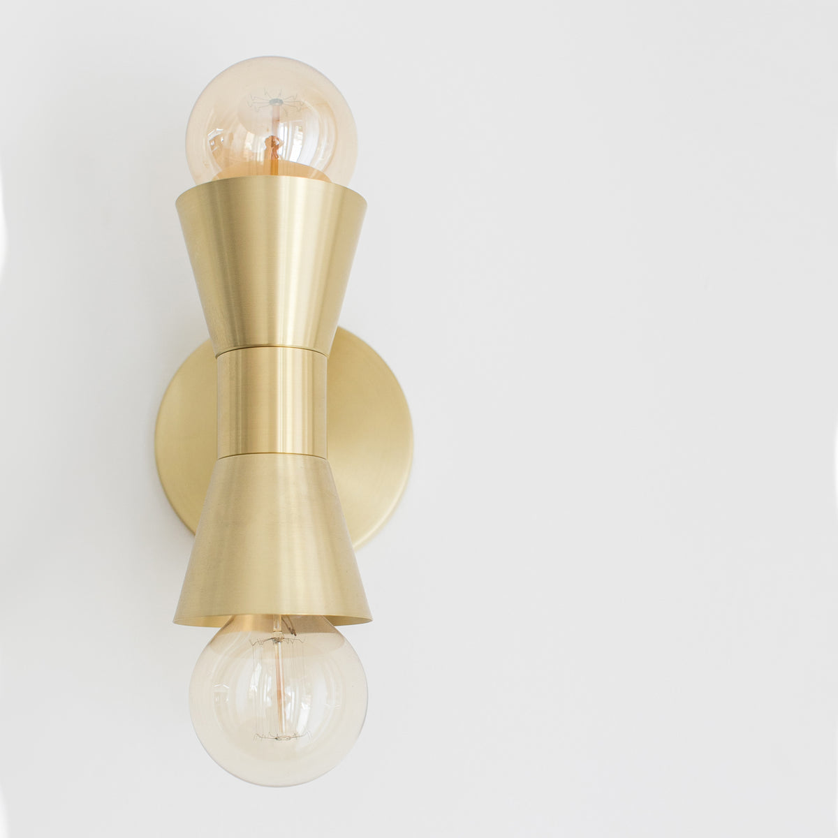 Mira shown in Brass. Interiors by Sarah Sherman Samuel for Sugar and Charm Studio