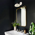 Terra Sconce in Bone with matte black, Interior Design by Zoe Feldman Design, Photography by Stacy Zarin Goldberg