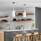 Tumwater Large Pendant shown in Brass with Walnut canopy. Interior design by Erin Barrett of Sunwoven. Photo by Margeret Wright