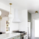 Lucia shown in Brass. Interior Design by Sarah Sherman Samuel for Smitten Studio