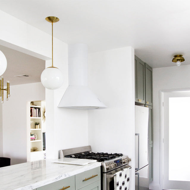 Lucia shown in Brass. Interior Design by Sarah Sherman Samuel for Smitten Studio