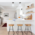 Alto Rod 8" Opal shown in Matte Black and Brass. Interior design by Carly Waters. Photo by Amy Bartlam