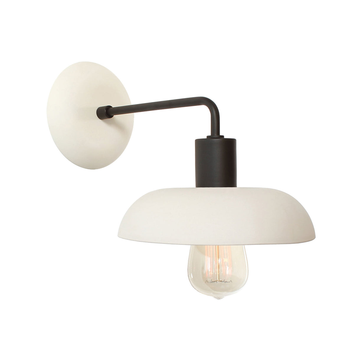 Terra Sconce shown in Bone ceramic finish with Matte Black metal