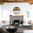 Timberline Sconce shown in Brass. Interior design by Jaclyn Johnson. Photo by Monica Wang