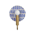 Edith ADA Sconce shown in Heirloom Brass with a Blue Dot Stripe Ceramic Canopy